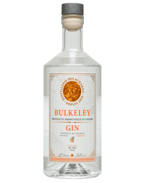 Photo d'une bouteille de gin aux agrumes de la Distillerie des Achards, un gin artisanal français