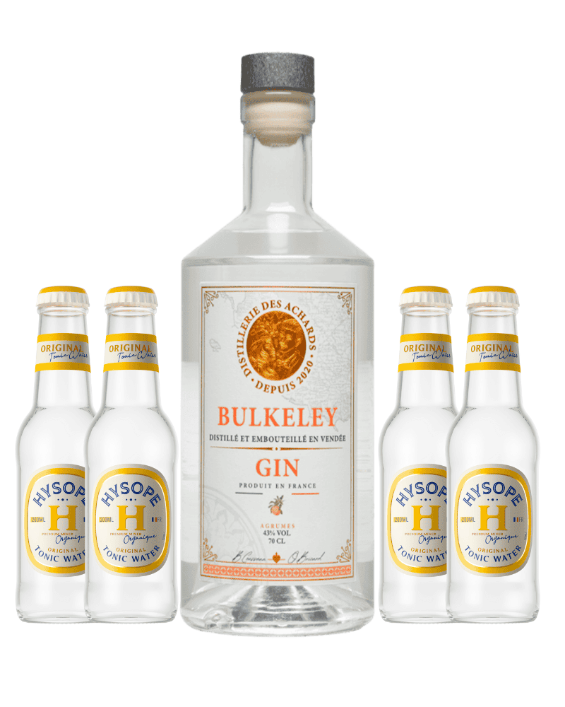 Bouteille de gin Bulkeley aux Agrumes entourée de quatre bouteilles de tonic Hysope sur fond blanc.